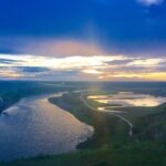 Sunset over the Bow River valley and wetlands at the south end of Fish Creek Provincial Park, just north of Chaparral